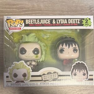Funko Pop Green and Black Beetlejuice & Lydia Figures